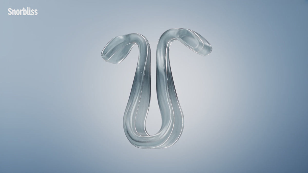Video showing the Snorbliss nasal dilator opening the nostrils, molding in warm water, and worn overnight