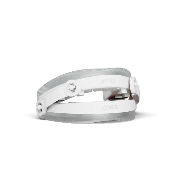 Snorbliss anti-snoring device seen from the side with the upper and lower trays labeled