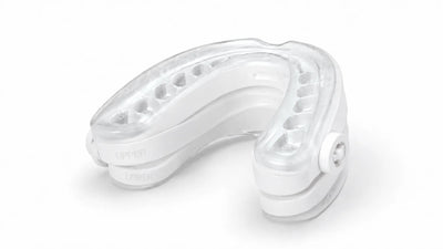 Clear Snorbliss anti-snoring mouthpiece showing the boil-and-bite moldable trays