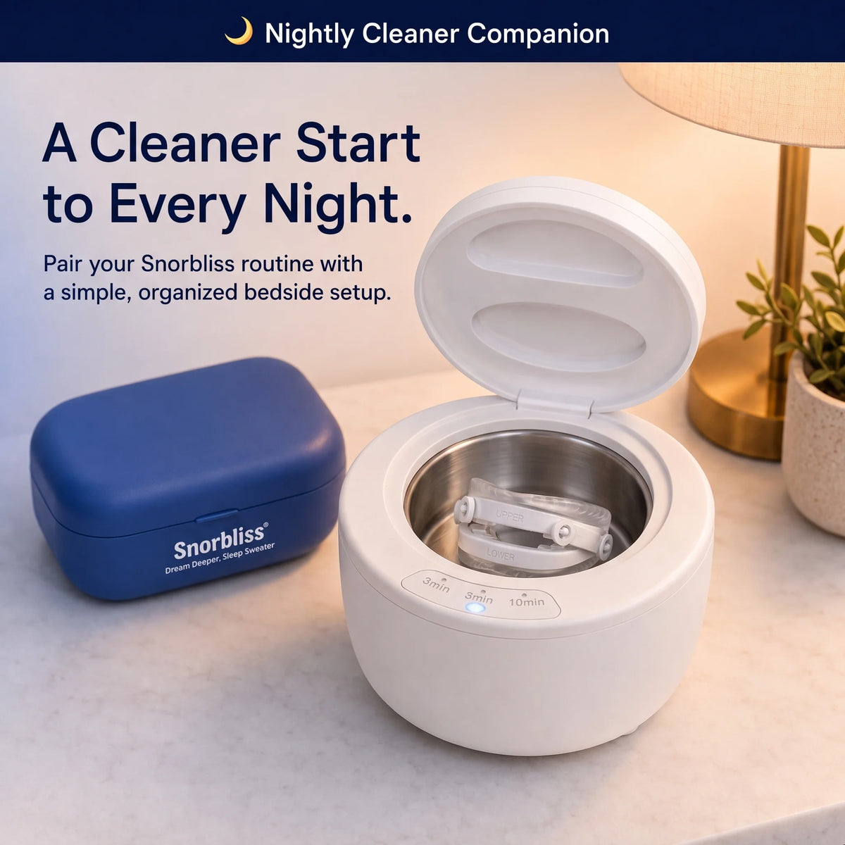 Snorbliss anti-snoring mouthpiece sitting inside the open ultrasonic cleaner, with the blue storage case alongside
